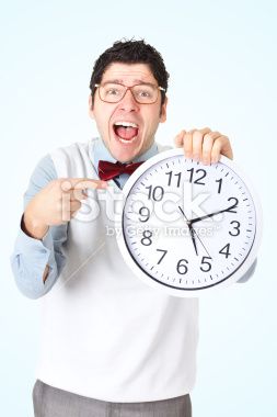 stock-photo-15981586-funny-businessman-holding-clock.jpg
