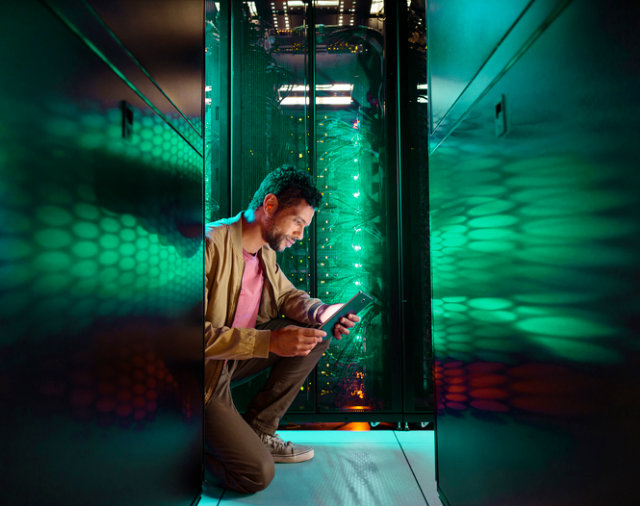 Man looking at tablet