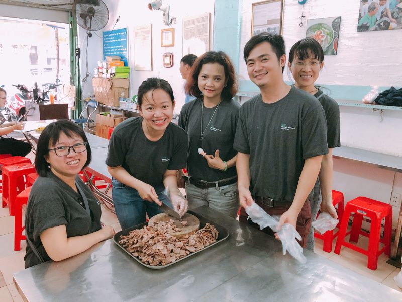 HPE employees in Vietnam helping out a food shelter as part of the Global Day of Service