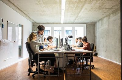 team working at table - level shot - June 2019.jpg