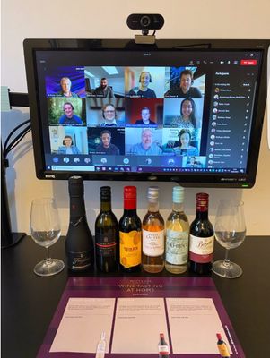 Remote wine tasting event with the team.