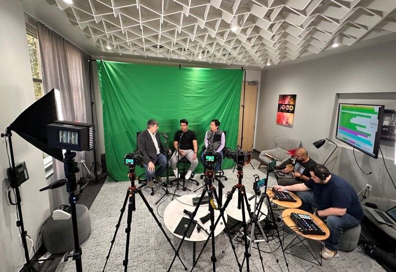 Dejan Milojicic and Hewlett Packard Labs’ From Research to Reality recording crew are shown here filming a video podcast in the lobby of Labs’ Milpitas, Calif., facility. Recording the podcast are Sai Chalamalasetti, formerly of HPE, and Pedro Bruel (far right). In front of the green screen, being filmed, are Milojicic (left), Shivang Aggarwal (center) and Lianjie Cao. Behind the camera taking pictures are Gourav Rattihalli and Pavana Prakash (not shown).