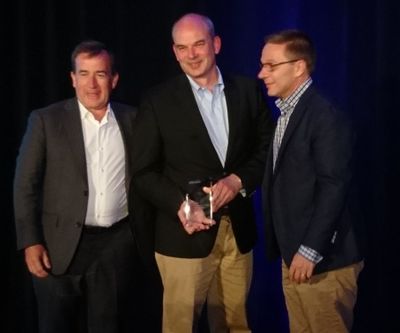 Pierre Mirlesse (Vice President for Health, Public Sector and Global Industries, HPE EMEA) collects the EMEA award from Jean-Philippe Barleaza (VP, Channel, Alliances and General Business, VMware EMEA) and Jean-Pierre Brulard (SVP and GM, VMware EMEA)