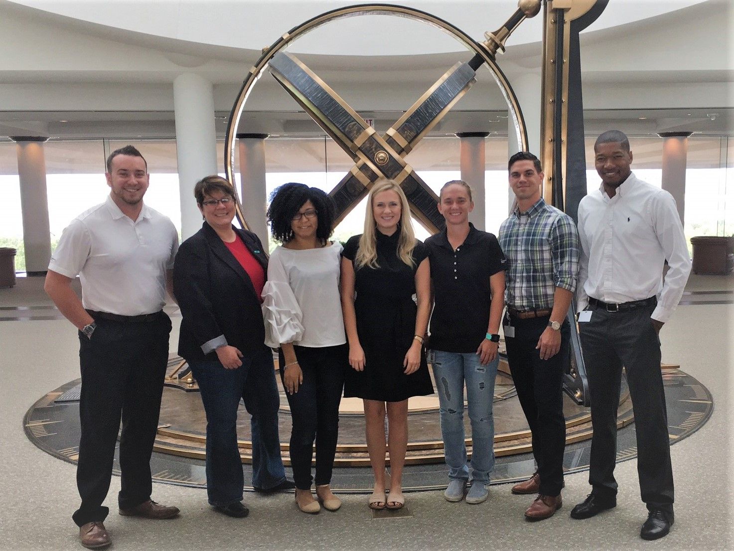 Four (4) recently transitioned veterans @ HPE with their teammates in Plano, TX